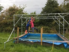 Monkey bars over water