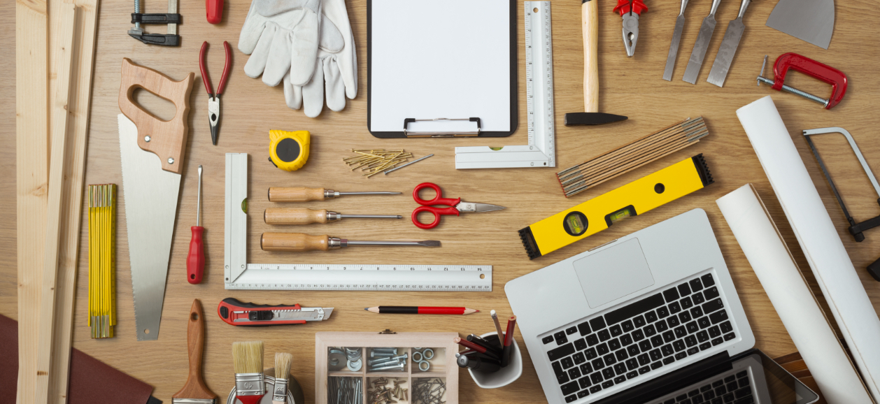 Tools for the finishing touches laid out on a desk